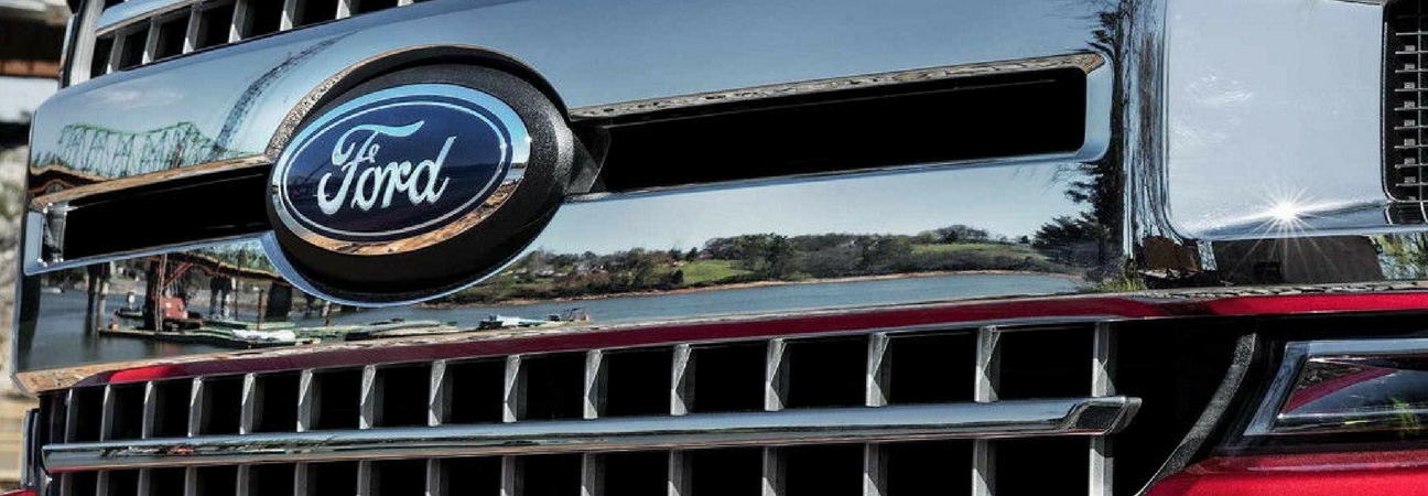 The grille of a 2018 Ford F-150 featured in a blog post about Ford cars