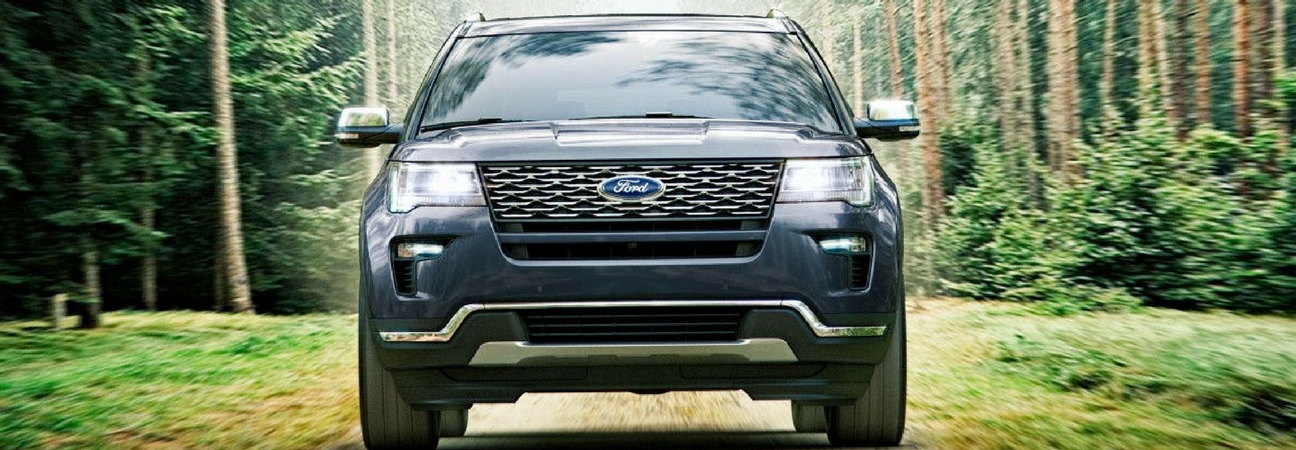 2018 Ford Explorer driving through the forrest